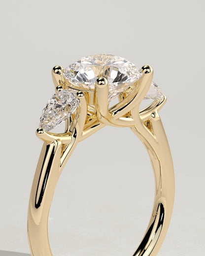 Adelyn - Round Claw Trilogy with Pear Side Stones and Open Trellis Gallery Engagement Ring - Yellow Gold