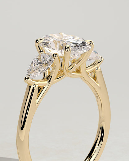 Amara - Oval Claw Trilogy with Pear Side Stones and Open Trellis Gallery Engagement Ring - Yellow Gold - yellow gold - Lara Jewels