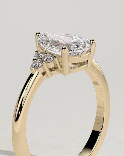 Brooke - Pear Claw Solitaire with Round Shoulder Stones Engagement Ring - Yellow Gold