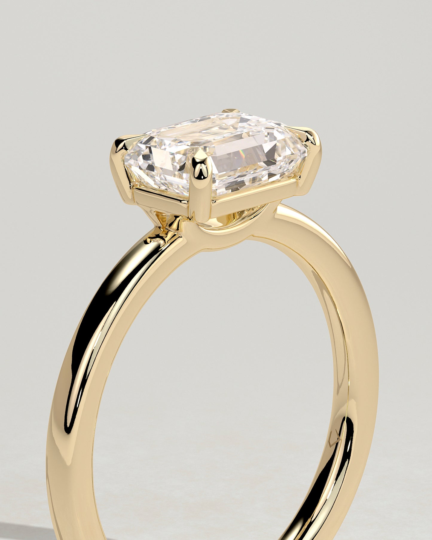 Evelyn - Emerald East West Claw Solitaire with Raised Basket Gallery Engagement Ring - Yellow Gold - Yellow Gold 2ct