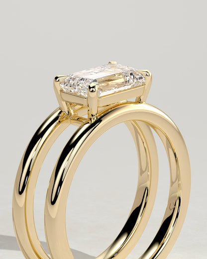 Devon - Emerald East West Claw Solitaire with Spaced Double Band Engagement Ring - Yellow Gold