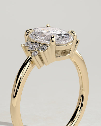 Esther - Oval Claw Solitaire with Clustered Round Opposing Shoulder Stones Engagement Ring - Yellow Gold