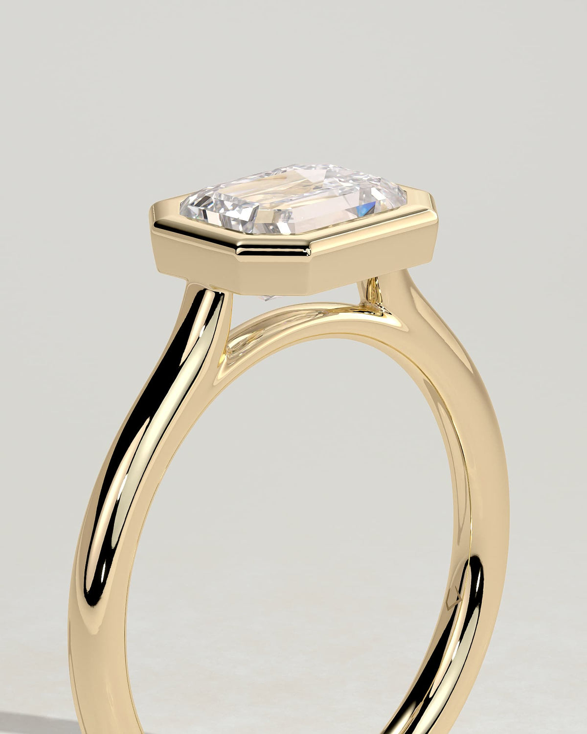 Olive - Statement Emerald East West Bezel Solitaire with Open Cathedral High Setting Engagement Ring - Yellow Gold