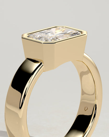 Frankie - Statement Radiant East West Bezel Solitaire with Flat Cigar Band Engagement Ring - Yellow Gold
