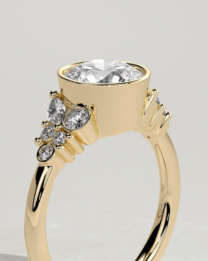 Alessia - Round Bezel Solitaire with Clustered Round-Marquise Mixed Set Shoulder Stones Engagement Ring - Yellow Gold