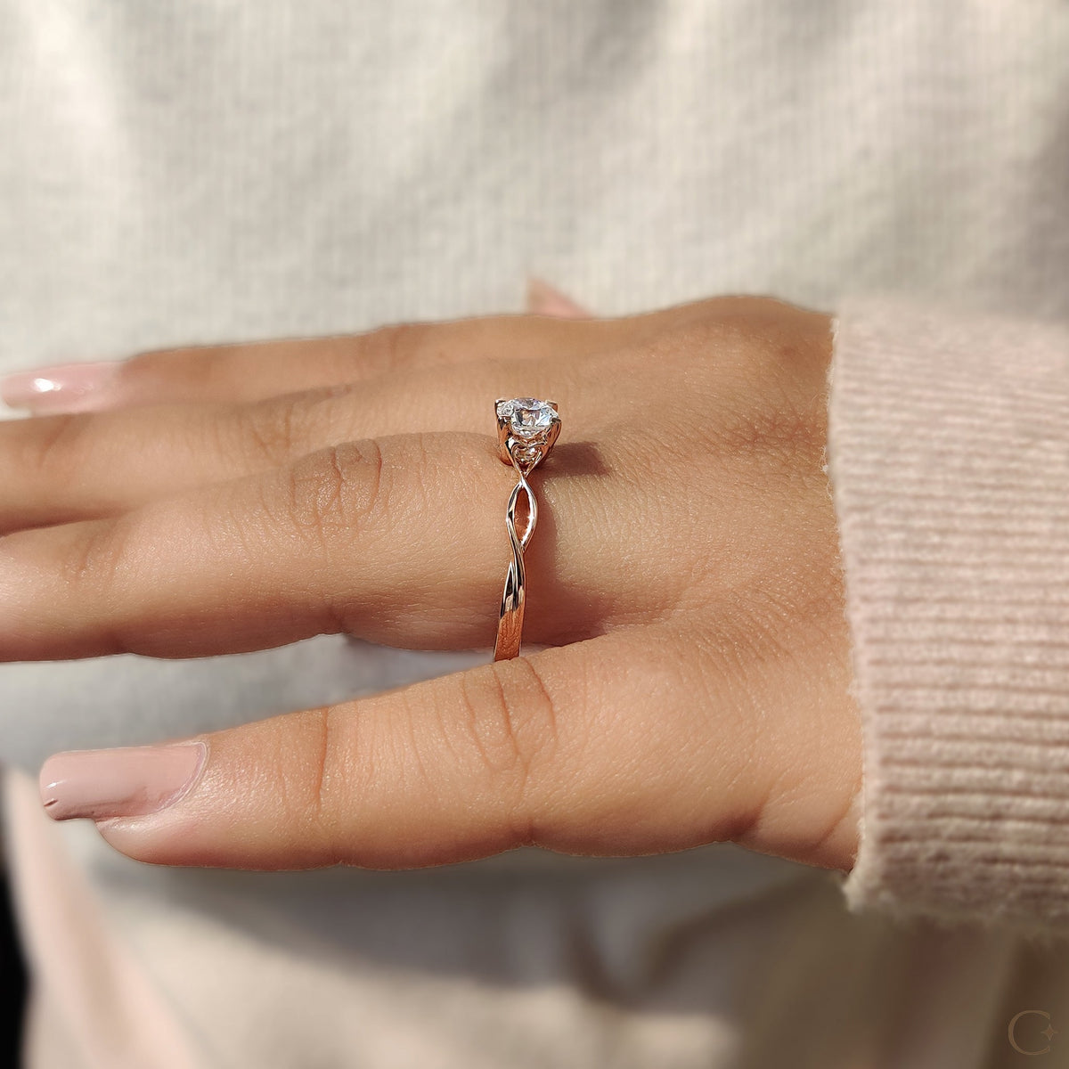 Round Solitaire Engagement Ring With Twisted Shank Band