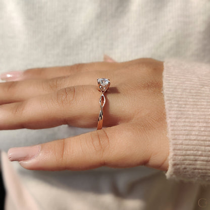 Round Solitaire Engagement Ring With Twisted Shank Band