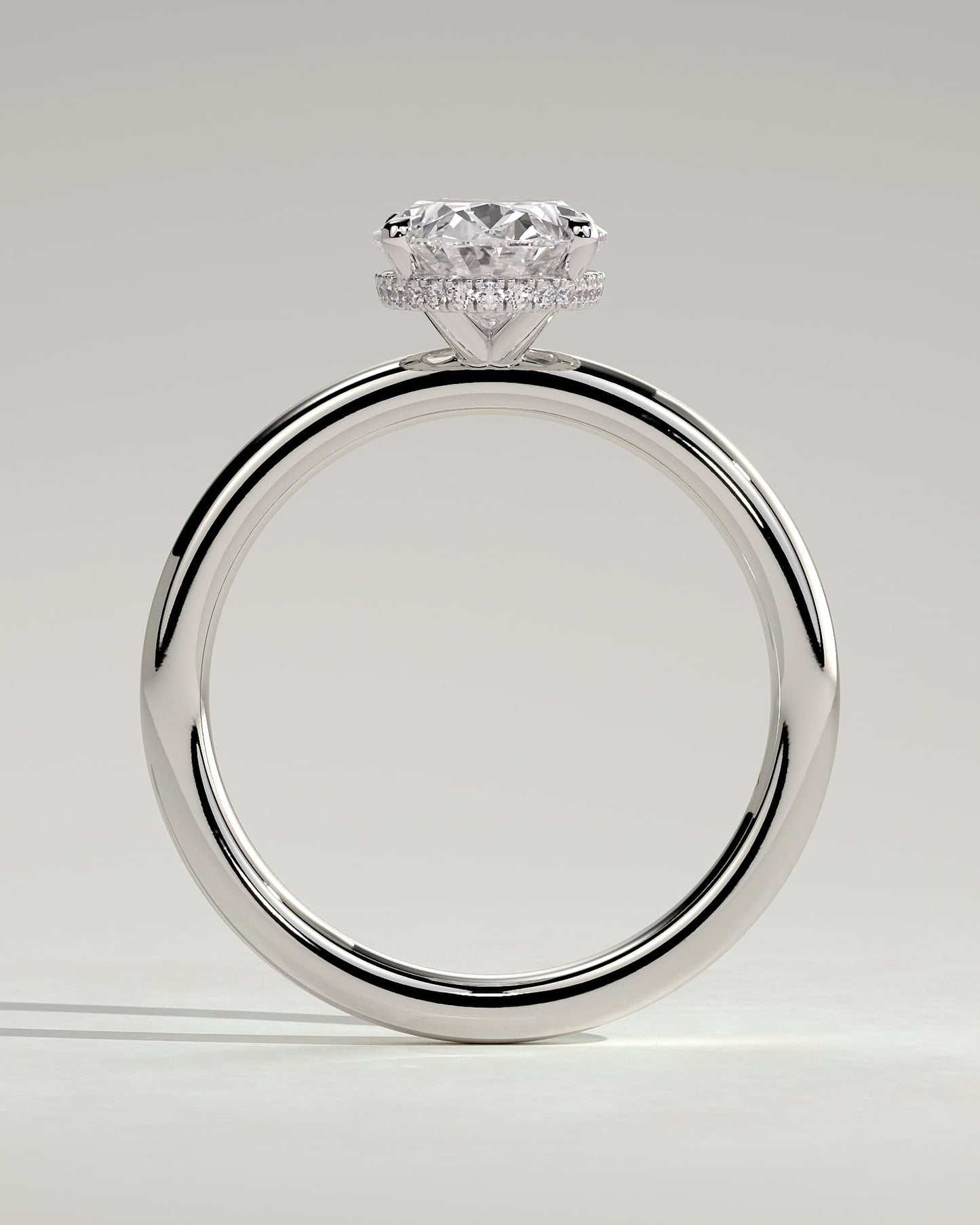 Cecilia - Oval Claw Solitaire with Wrap Around Hidden Halo Engagement Ring - White Gold