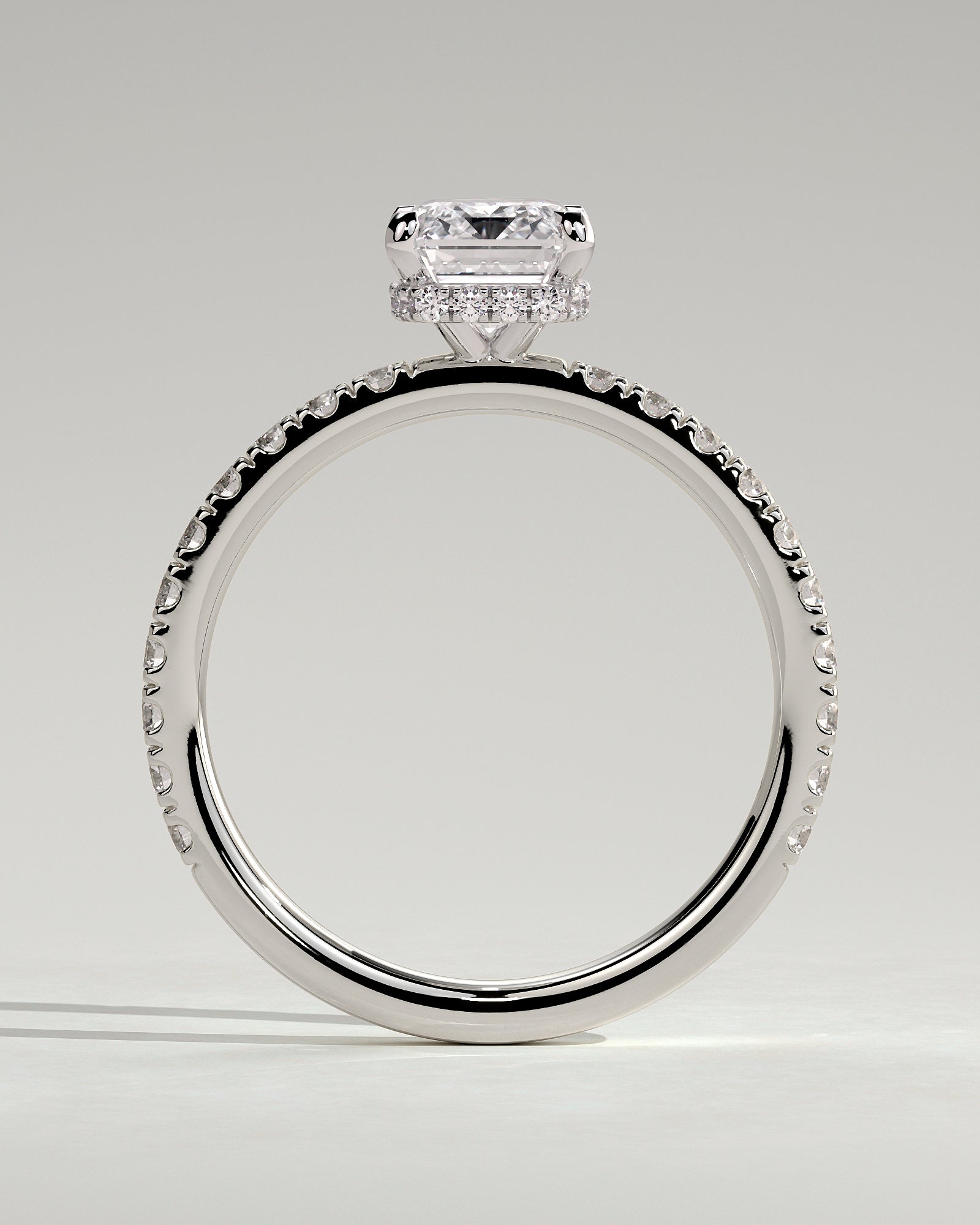 Eliana - Emerald Claw Solitaire with Wrap Around Hidden Halo and Pave Band Engagement Ring - Platinum - White Gold / Platinum 2ct