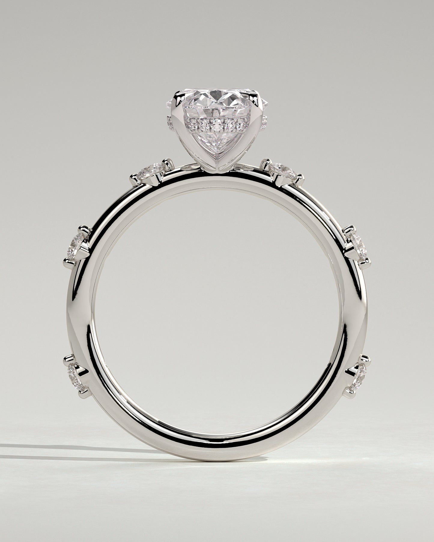 Elise - Oval Claw Solitaire with 6 Spaced Round Accent Stones and Hidden Halo Engagement Ring - Platinum - White Gold / Platinum 2ct