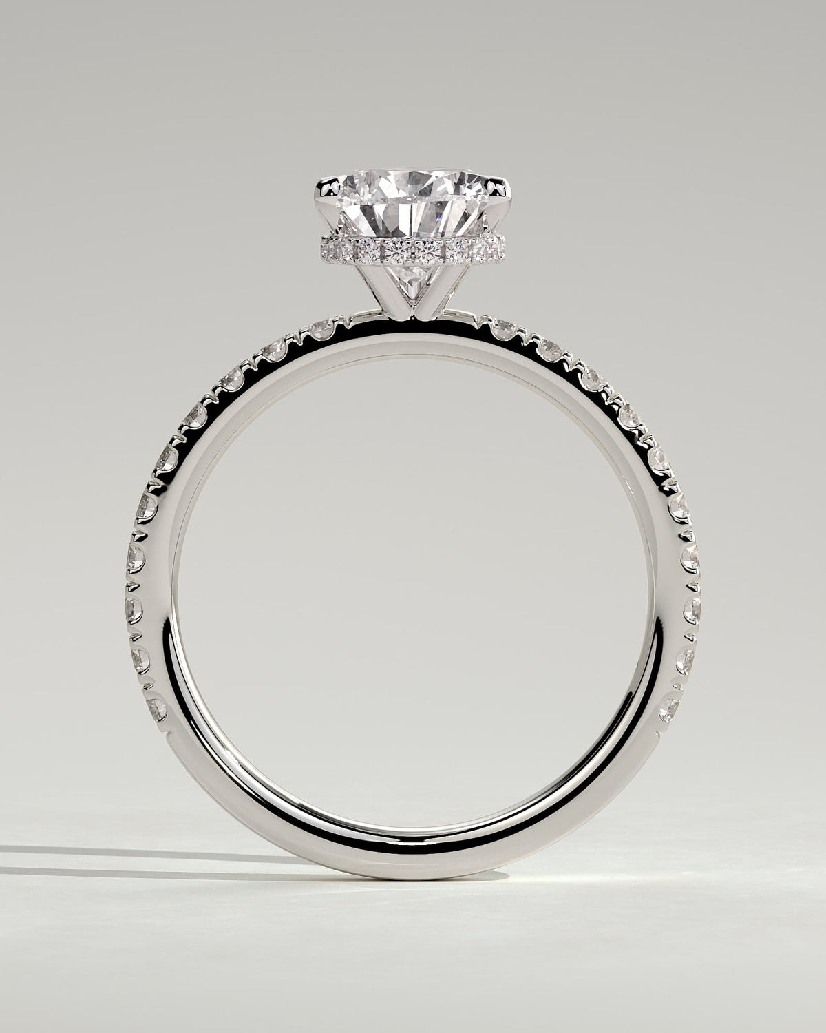 Keira - Pear Claw Solitaire with Wrap Around Hidden Halo and Pave Band Engagement Ring - White Gold