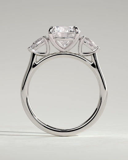 Arya - Round Claw Trilogy with Pear Side Stones and Cathedral Setting Engagement Ring - White Gold
