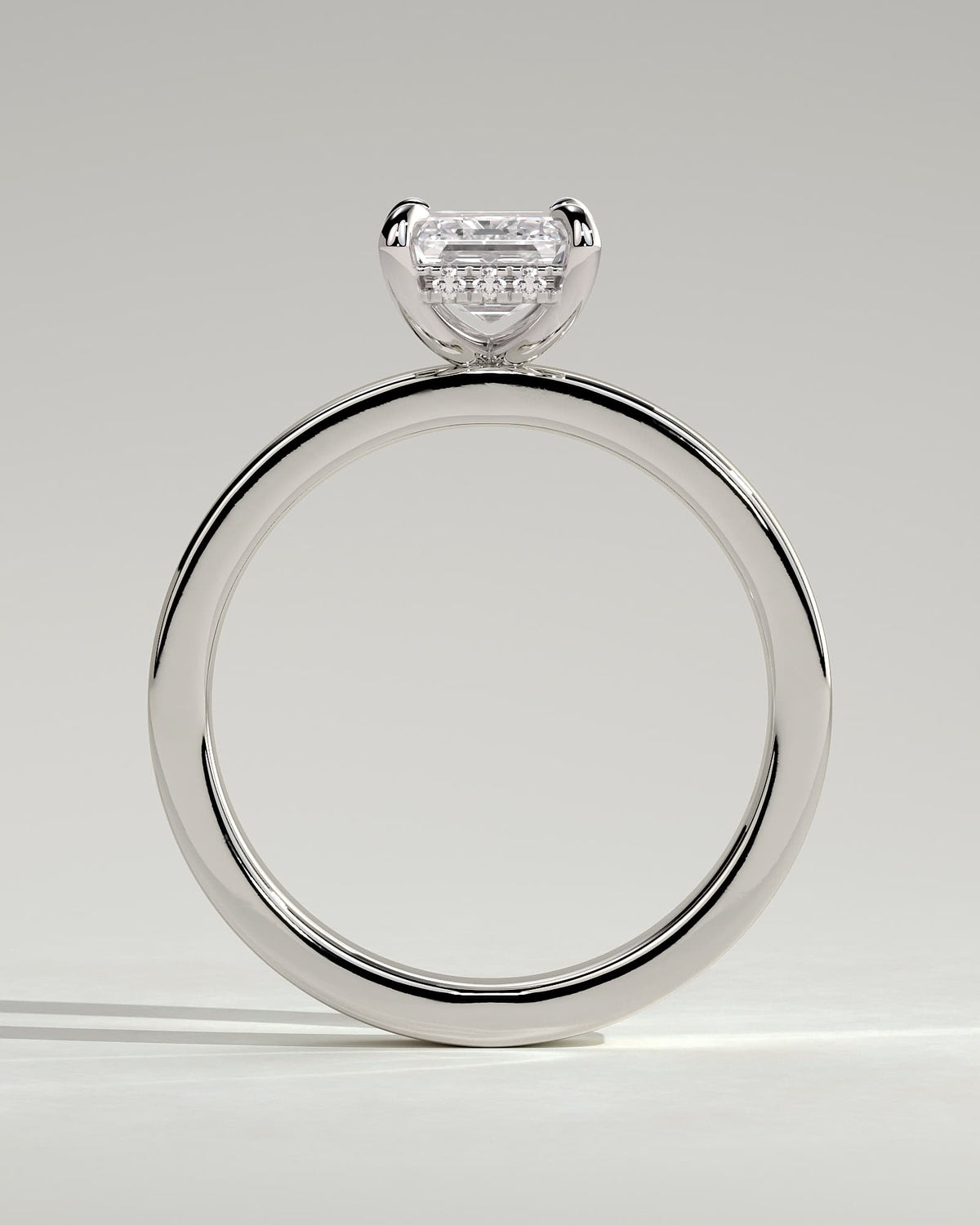 Carmella - Emerald Claw Solitaire with Flat Cigar Band and Hidden Halo Engagement Ring - White Gold