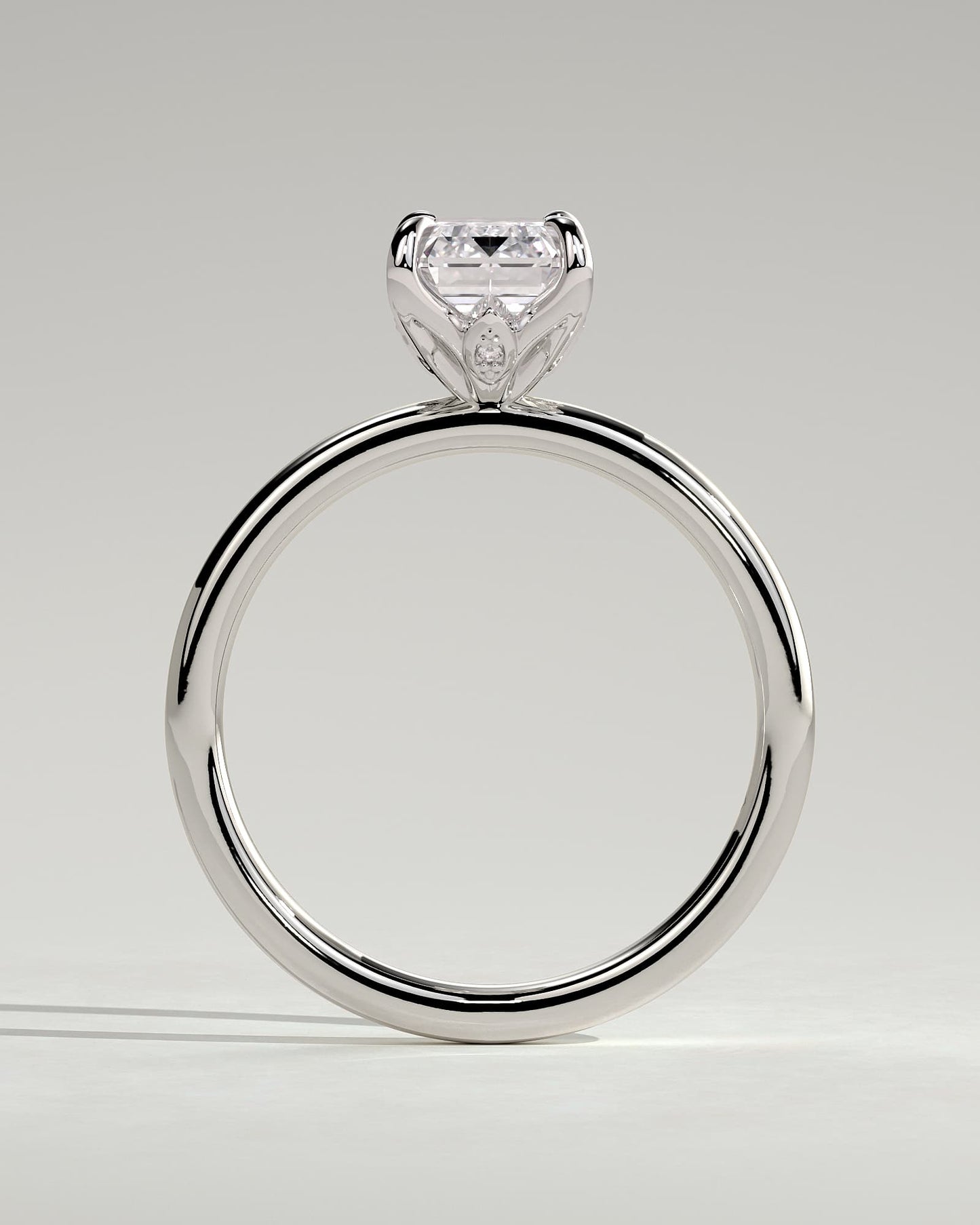 Dove - Emerald Claw Solitaire with Petal Gallery and Accent Leaf Detail Engagement Ring - White Gold