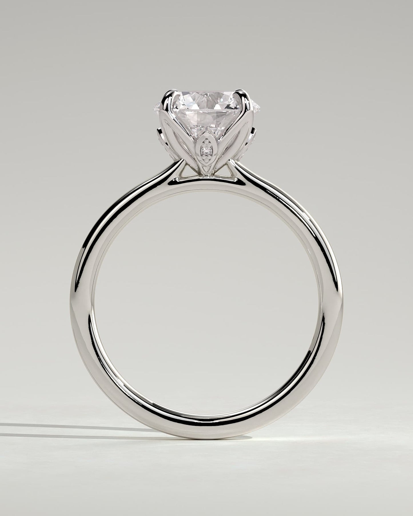 Brianna - Round Claw Solitaire with Petal Gallery, Accent Leaf Detail and Cathedral Setting Engagement Ring - Platinum