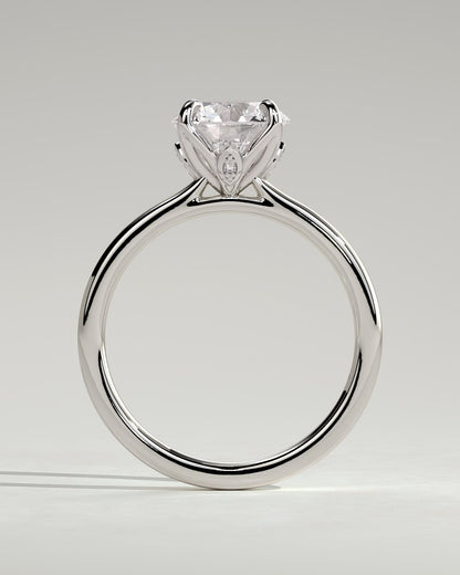 Brianna - Round Claw Solitaire with Petal Gallery, Accent Leaf Detail and Cathedral Setting Engagement Ring - Platinum