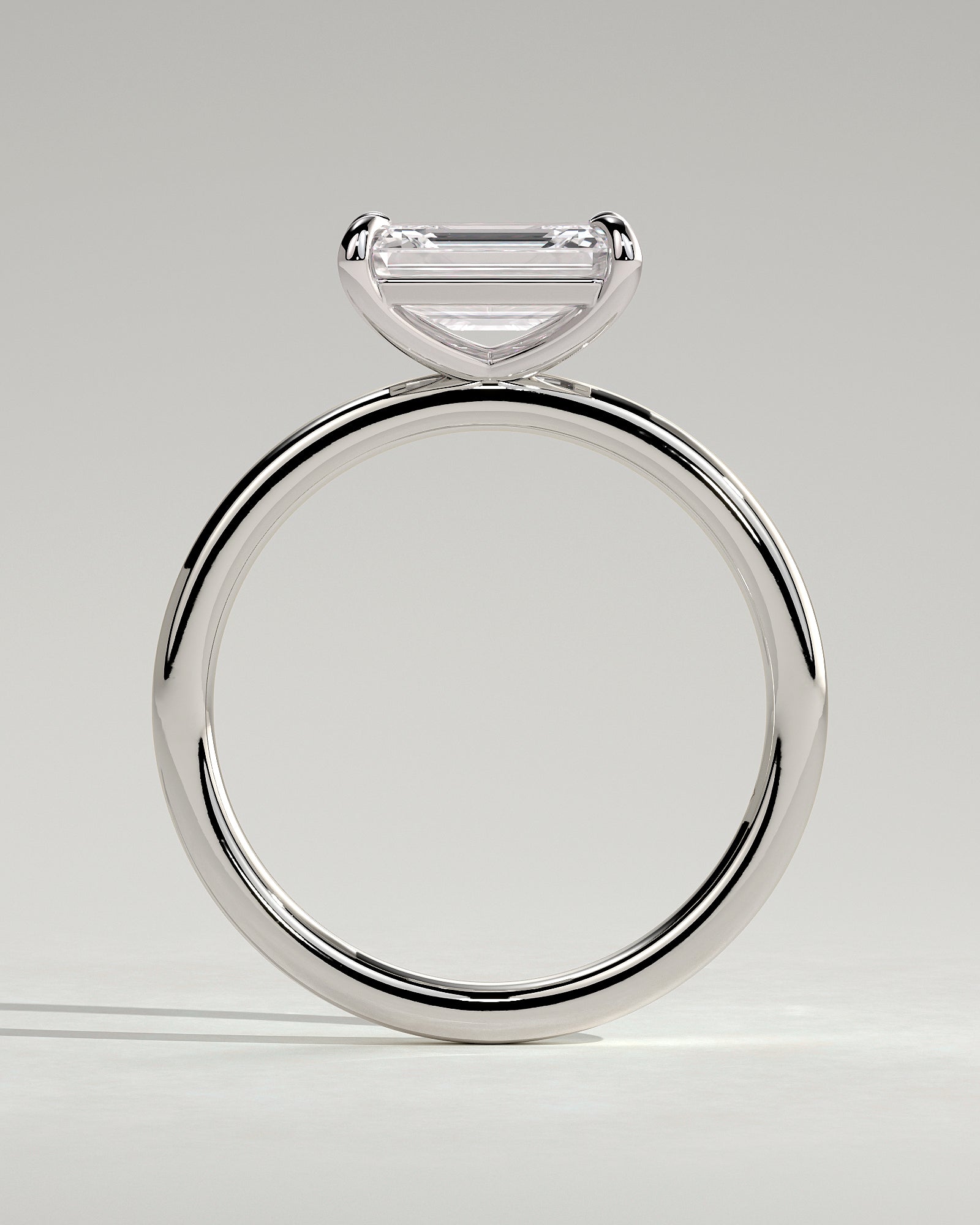 Debbie - Emerald East West Claw Solitaire Engagement Ring - Platinum - White Gold / Platinum 2ct
