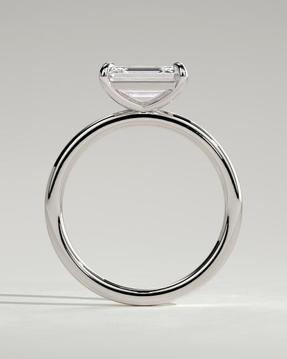 Debbie - Emerald East West Claw Solitaire Engagement Ring - Platinum
