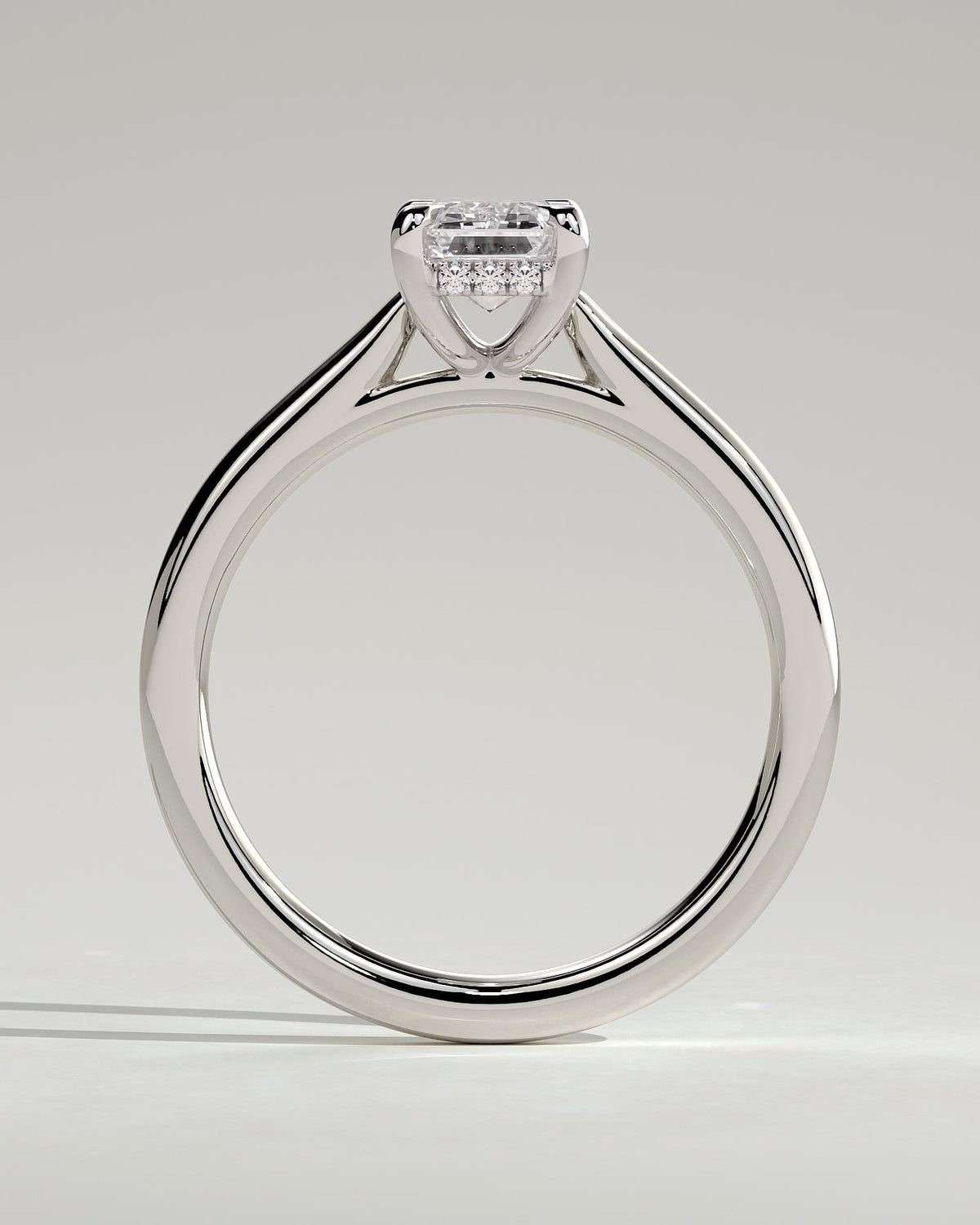 Jane - Emerald Claw Solitaire with Hidden Halo and Cathedral High Setting Engagement Ring - White Gold
