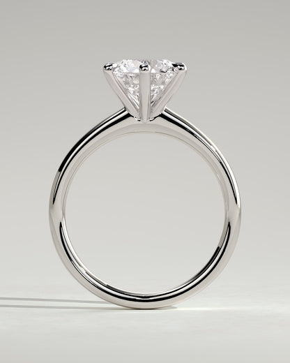 Daniela - Round Claw Solitaire with Solid Cathedral High Setting Engagement Ring - Platinum