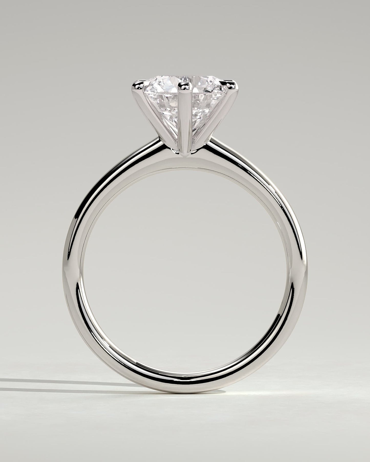 Daniela - Round Claw Solitaire with Solid Cathedral High Setting Engagement Ring - White Gold