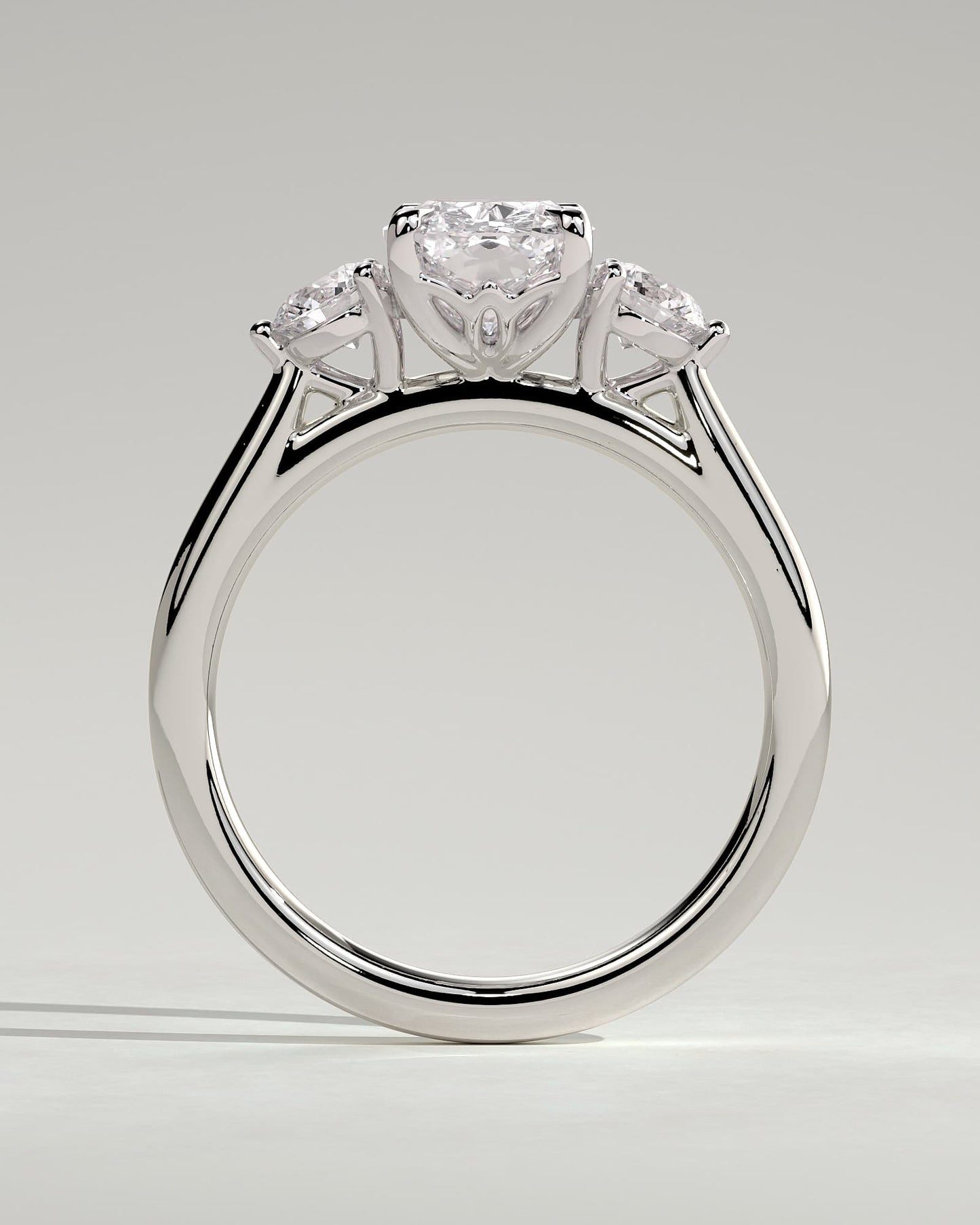 Charmaine - Elongated Cushion Claw Trilogy with Round Side Stones and Lily Detail Engagement Ring - White Gold