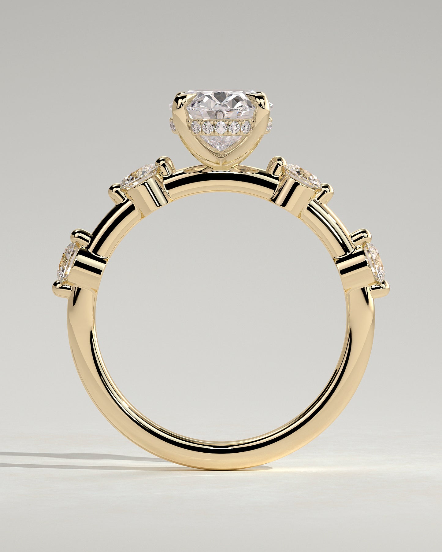 Arwen - Oval Claw Solitaire with 4 Spaced Round Accent Stones and Hidden Halo Engagement Ring - Yellow Gold - Yellow Gold 2ct