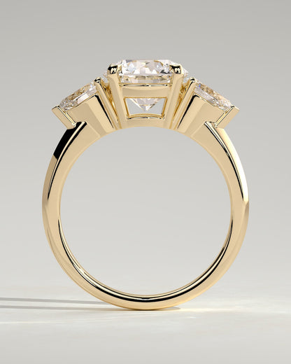Halle - Round Claw Trilogy with Pear Side Stones and Knife Edge Band Engagement Ring - Yellow Gold