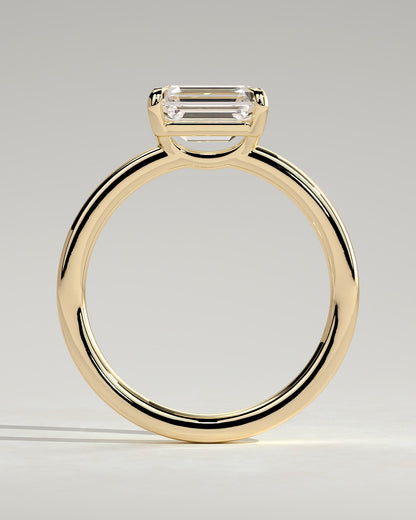 Evelyn - Emerald East West Claw Solitaire with Raised Basket Gallery Engagement Ring - Yellow Gold