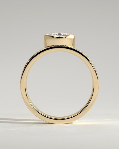 Carmen - Oval Bezel Solitaire with Offset Setting and Flat Cigar Band Engagement Ring - Yellow Gold