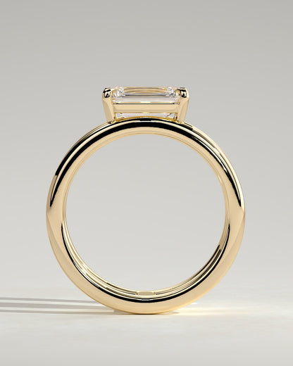 Devon - Emerald East West Claw Solitaire with Spaced Double Band Engagement Ring - Yellow Gold