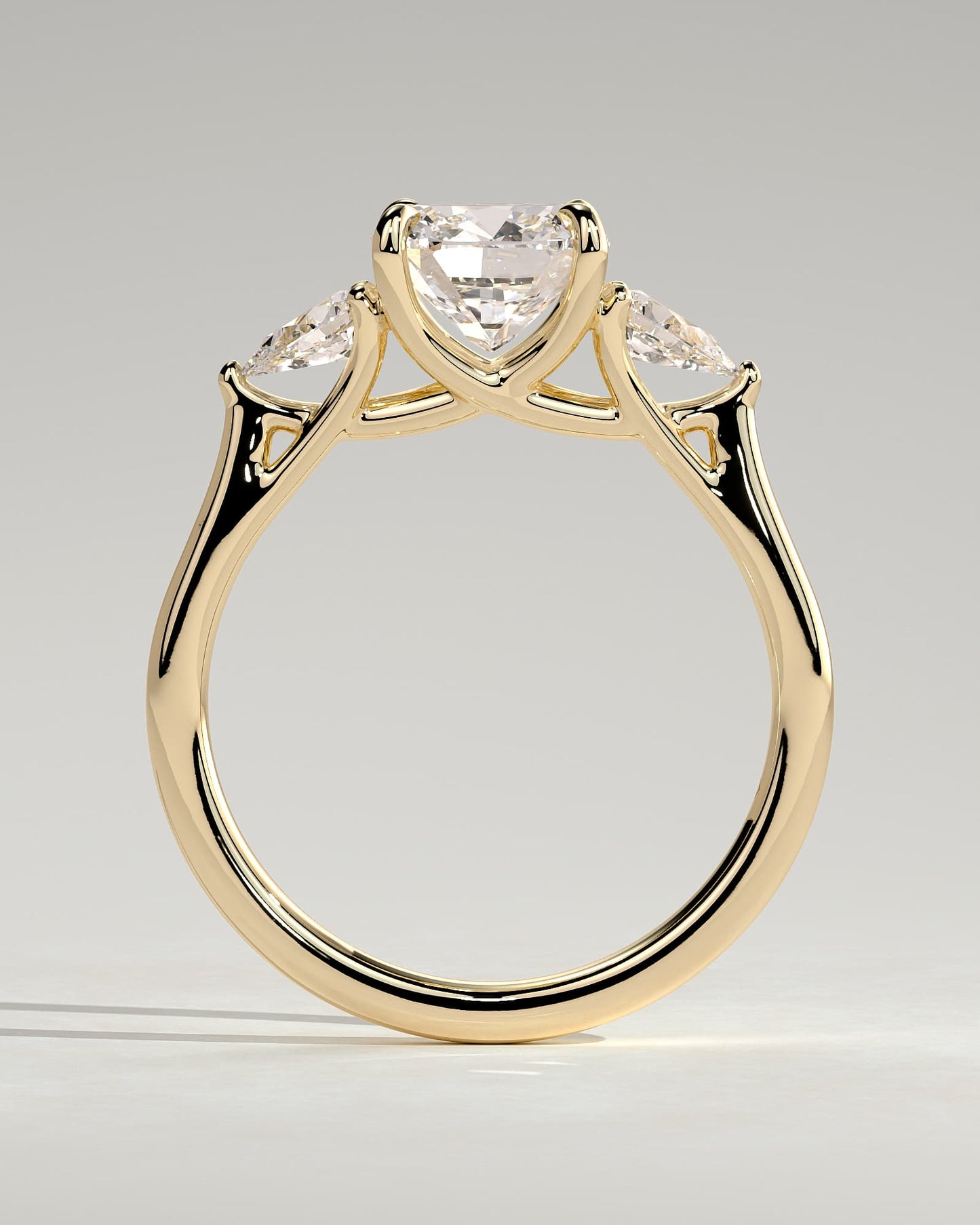 Selena - Cushion Claw Trilogy with Pear Side Stones and Open Trellis Gallery Engagement Ring - Yellow Gold