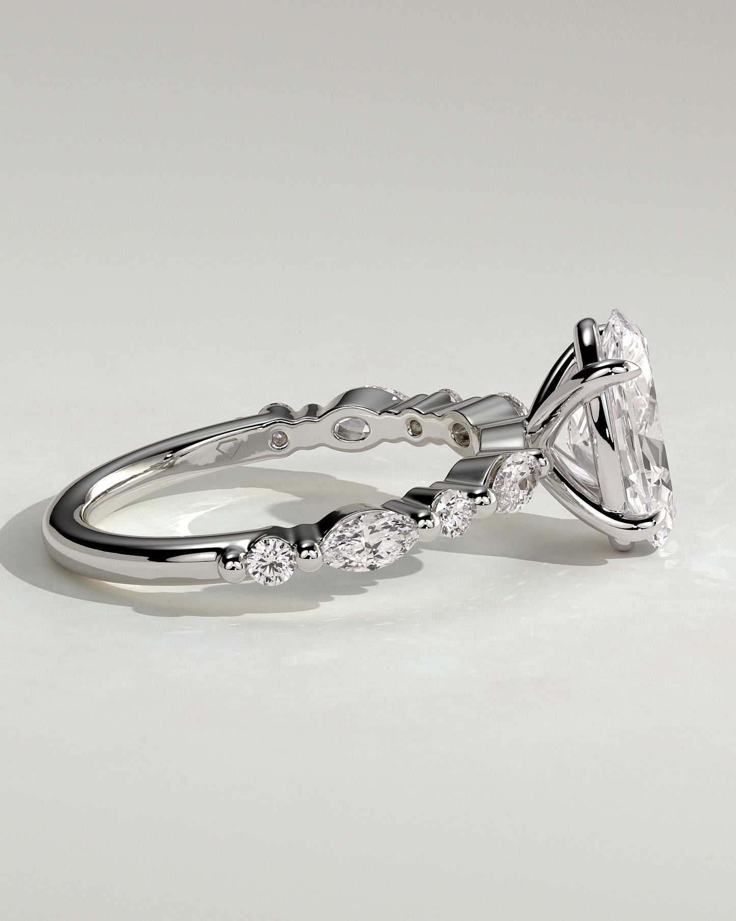 Alyssa - Oval Claw Solitaire with Marquise and Round Accent Stones Engagement Ring - Platinum - White Gold / Platinum 2ct