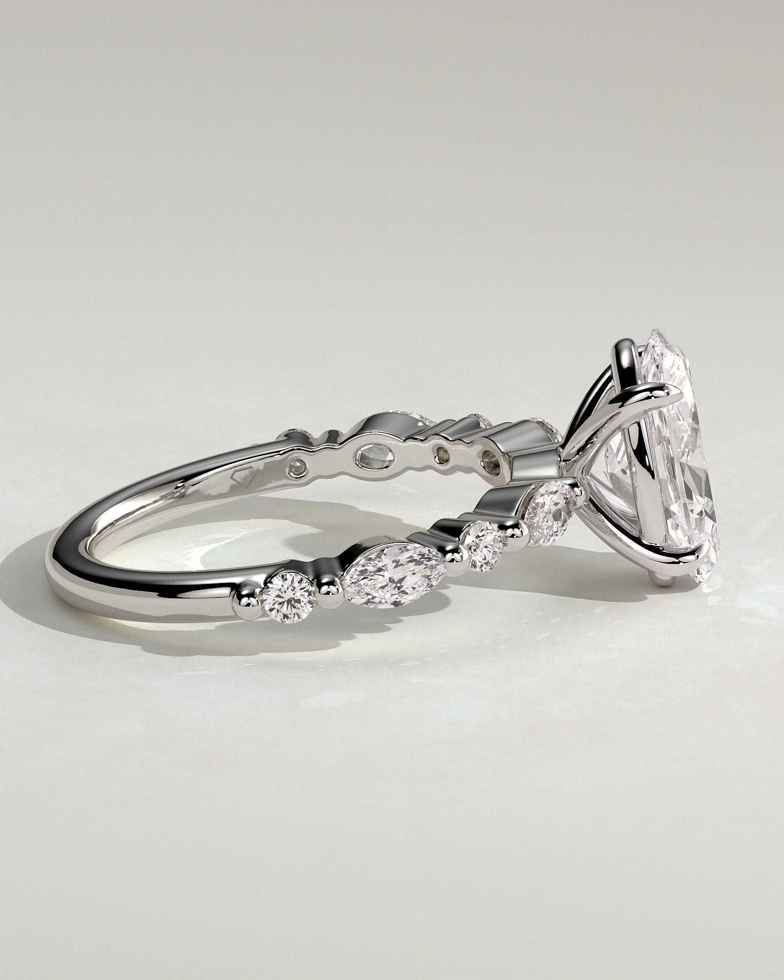 Alyssa - Oval Claw Solitaire with Marquise and Round Accent Stones Engagement Ring - Platinum - White Gold / Platinum 2ct