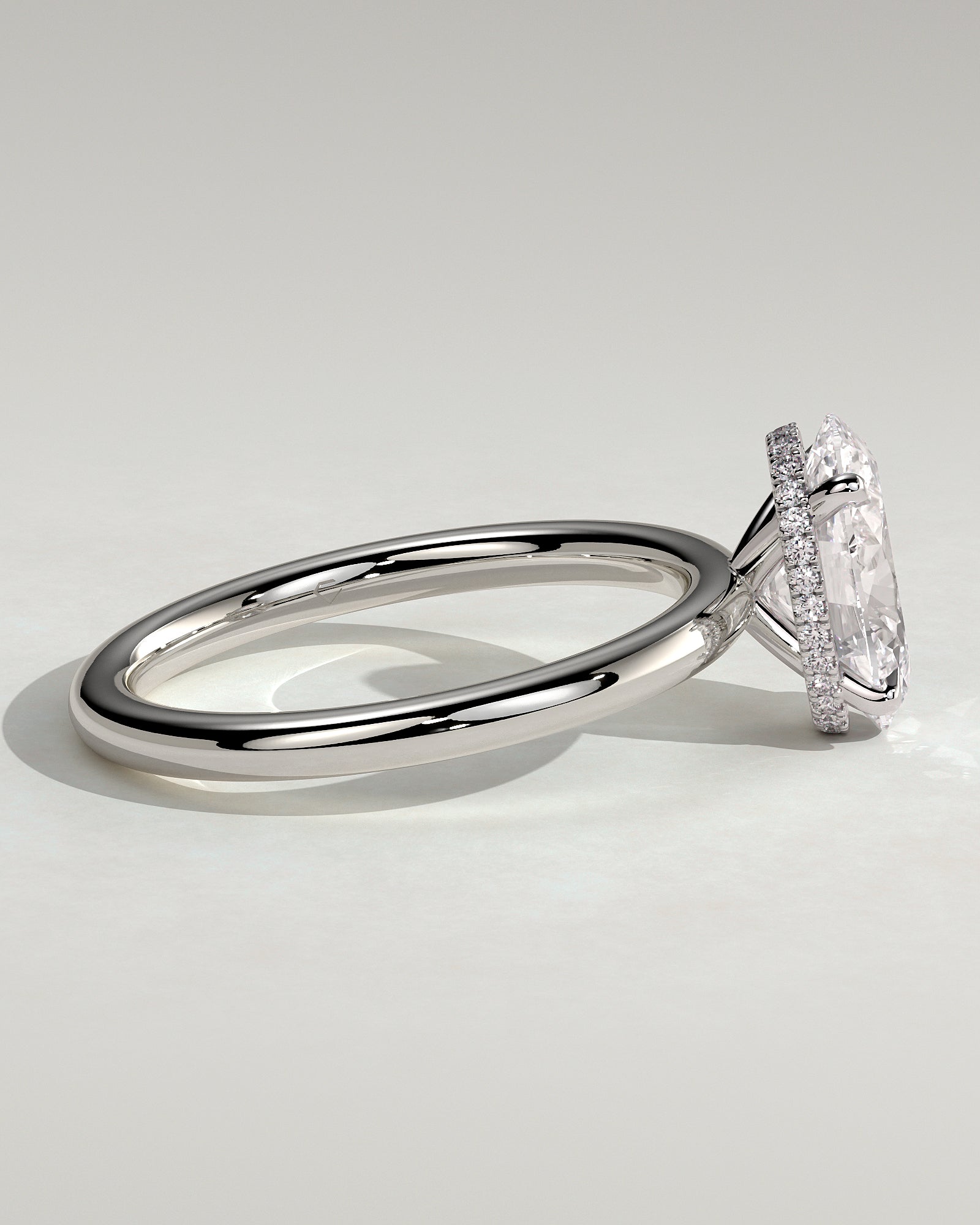 Cecilia - Oval Claw Solitaire with Wrap Around Hidden Halo Engagement Ring - Platinum - White Gold / Platinum 2ct