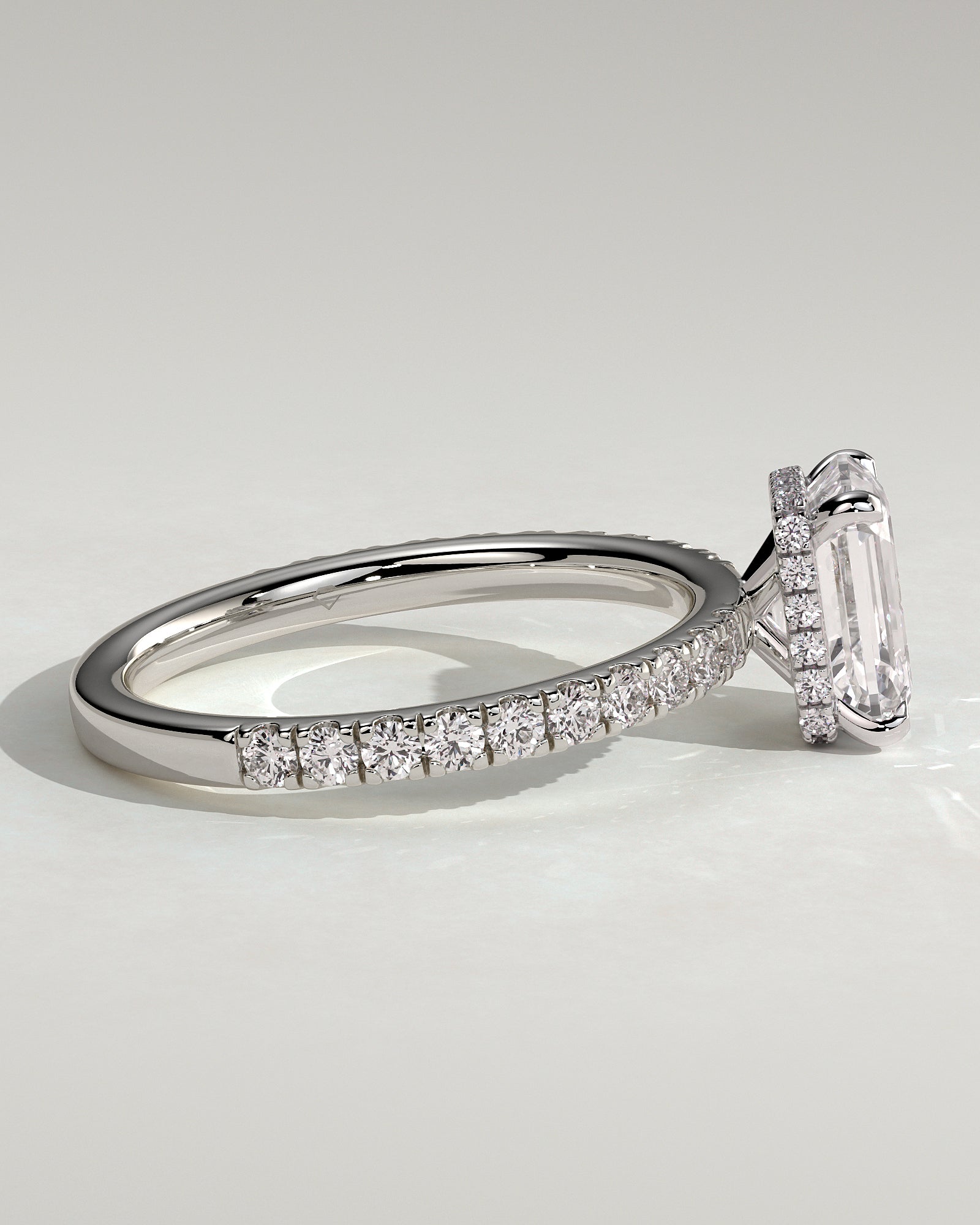 Eliana - Emerald Claw Solitaire with Wrap Around Hidden Halo and Pave Band Engagement Ring - Platinum - White Gold / Platinum 2ct