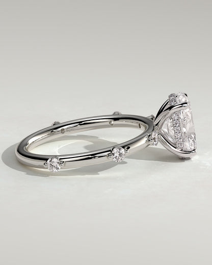 Elise - Oval Claw Solitaire with 6 Spaced Round Accent Stones and Hidden Halo Engagement Ring - Platinum