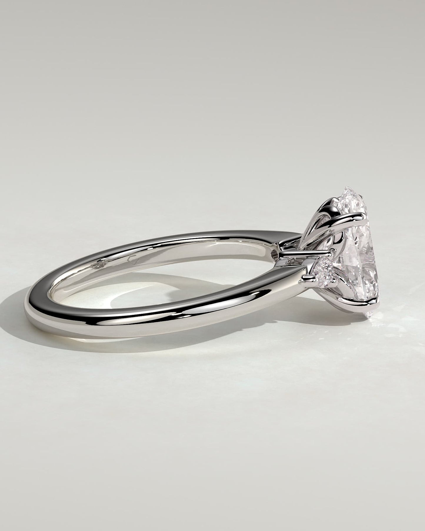 Elena - Oval Claw Trilogy with Pear Side Stones and Tulip Detail Engagement Ring - White Gold