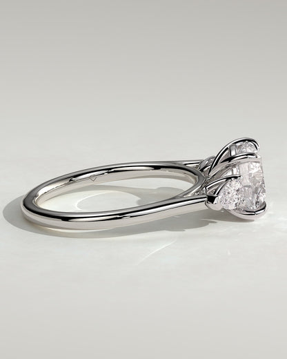 Arya - Round Claw Trilogy with Pear Side Stones and Cathedral Setting Engagement Ring - Platinum