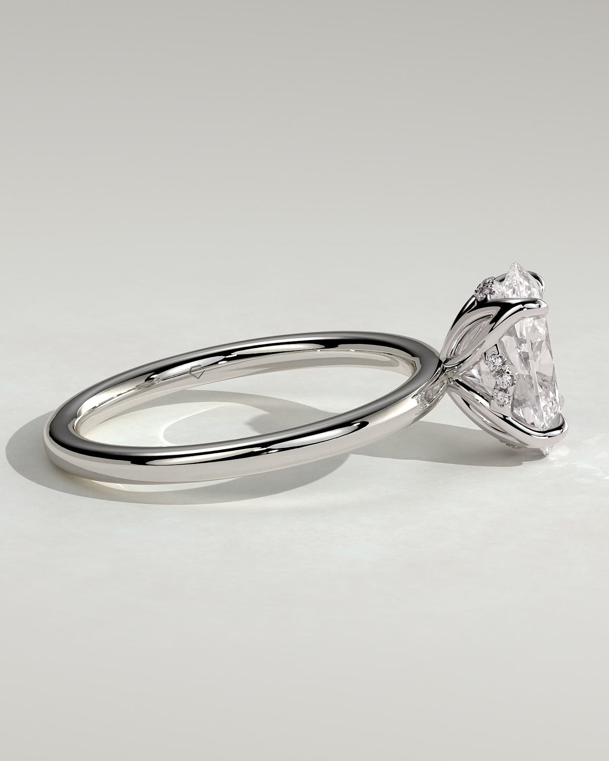 Ivy - Oval Claw Solitaire with Petal Gallery and Accented Tiara Detail Engagement Ring - White Gold