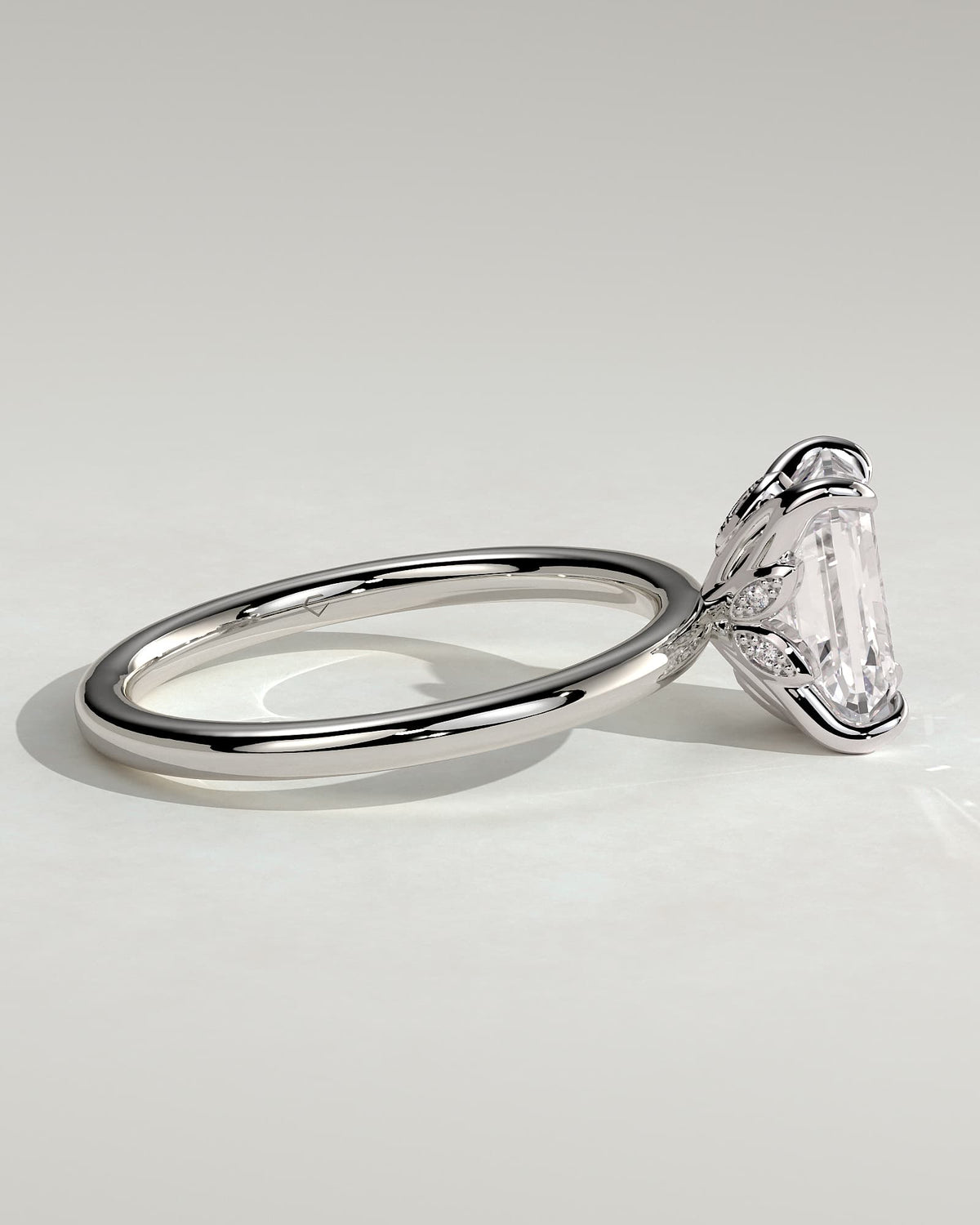 Dove - Emerald Claw Solitaire with Petal Gallery and Accent Leaf Detail Engagement Ring - White Gold