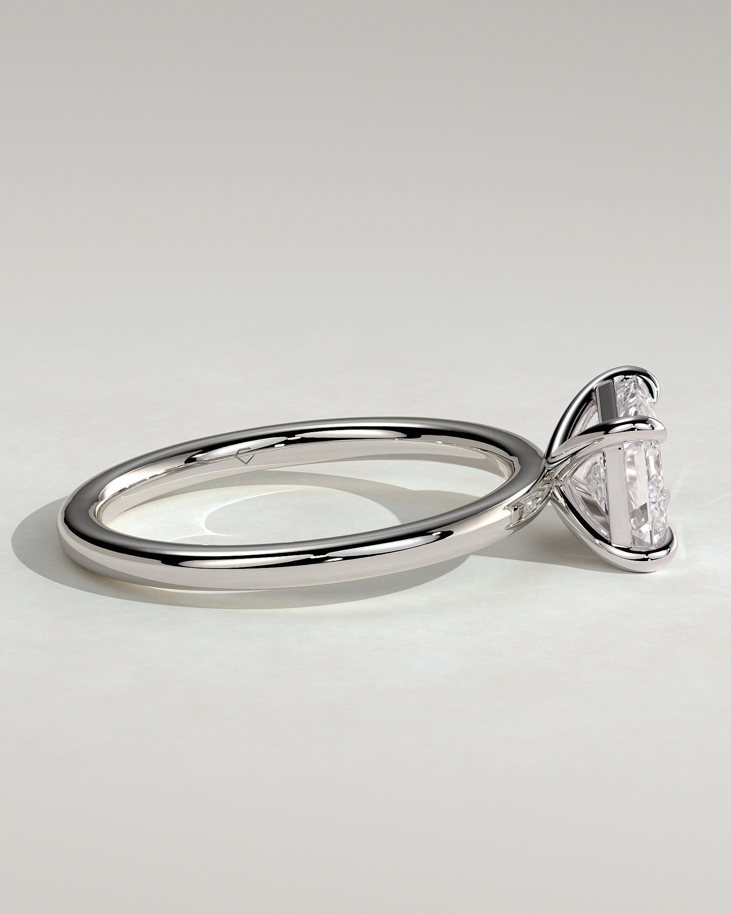 Debbie - Emerald East West Claw Solitaire Engagement Ring - Platinum - White Gold / Platinum 2ct