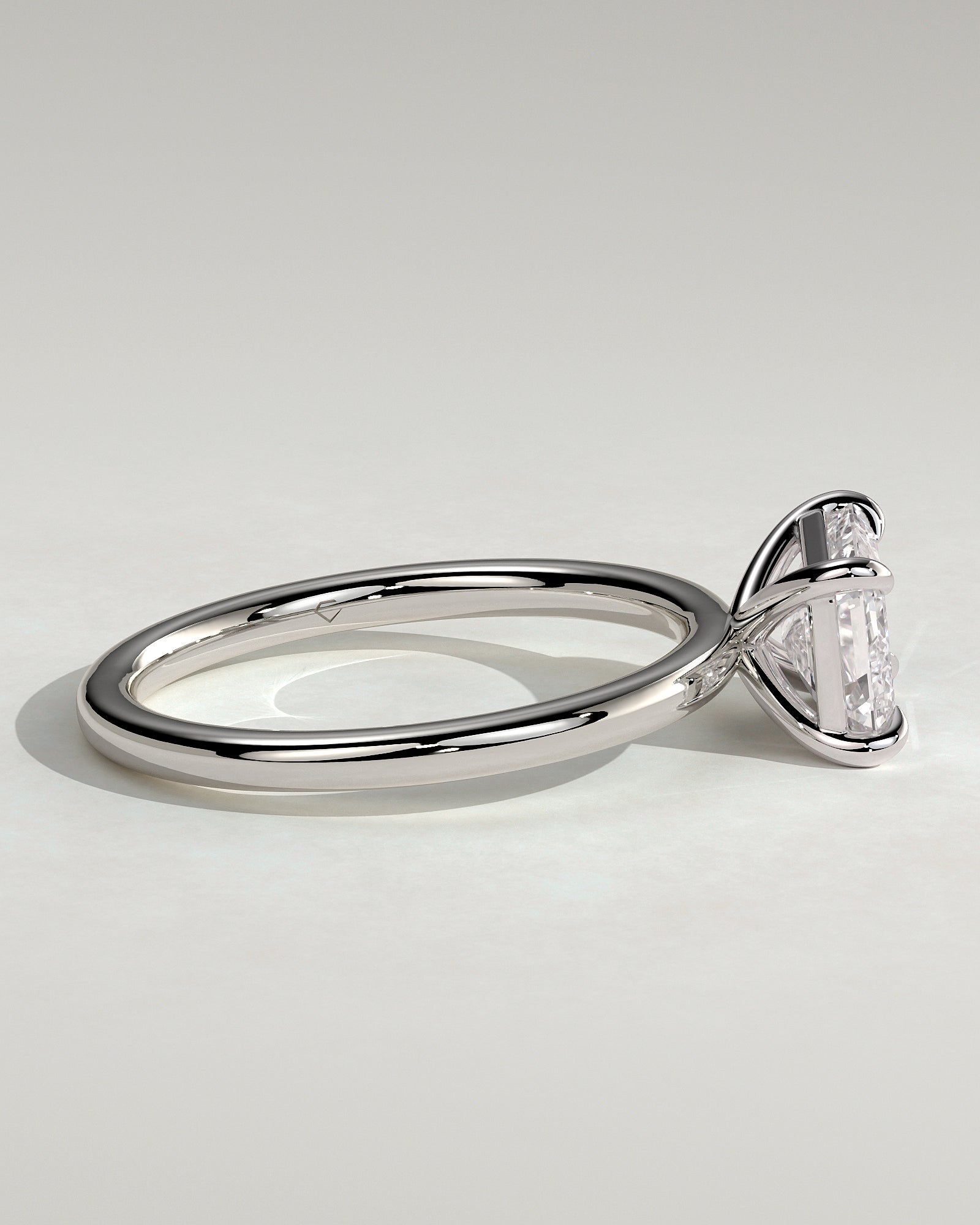 Debbie - Emerald East West Claw Solitaire Engagement Ring - Platinum - White Gold / Platinum 2ct