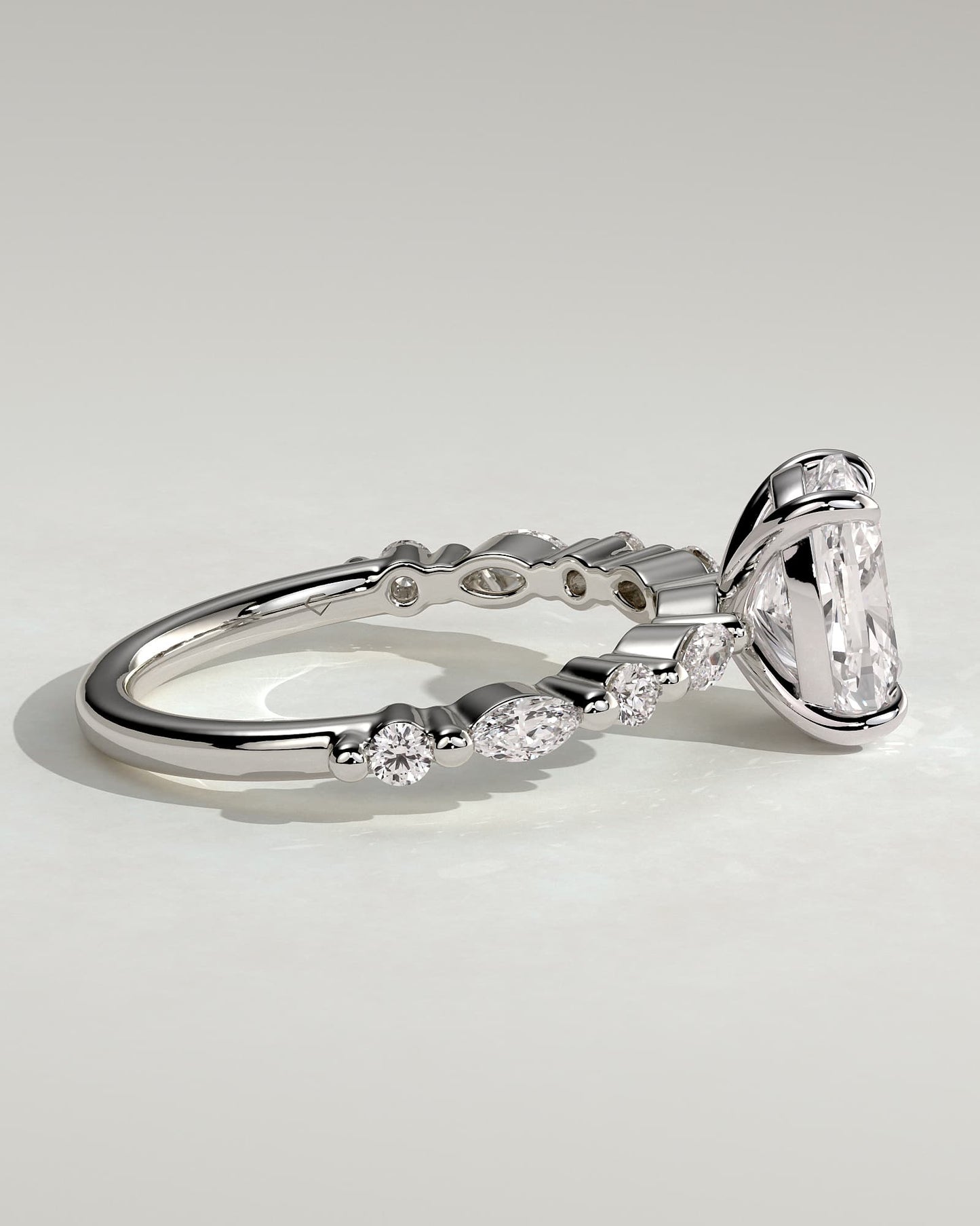 Delphine - Elongated Cushion Claw Solitaire with Marquise and Round Accent Stones Engagement Ring - White Gold