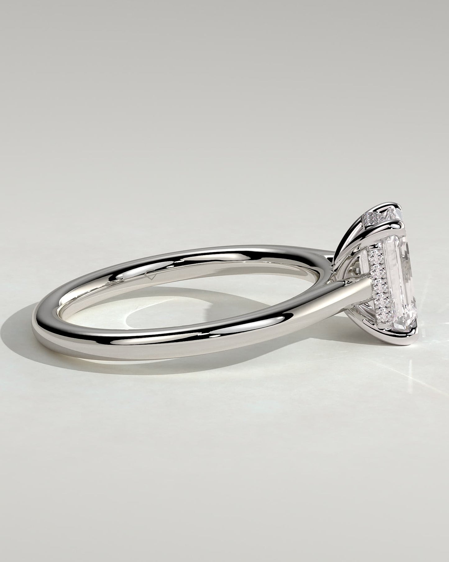 Jane - Emerald Claw Solitaire with Hidden Halo and Cathedral High Setting Engagement Ring - White Gold