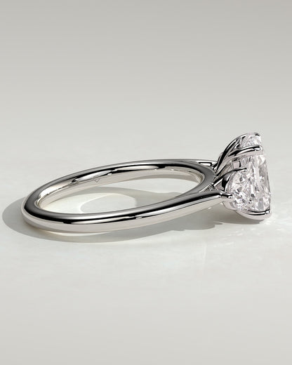 Charmaine - Elongated Cushion Claw Trilogy with Round Side Stones and Lily Detail Engagement Ring - Platinum