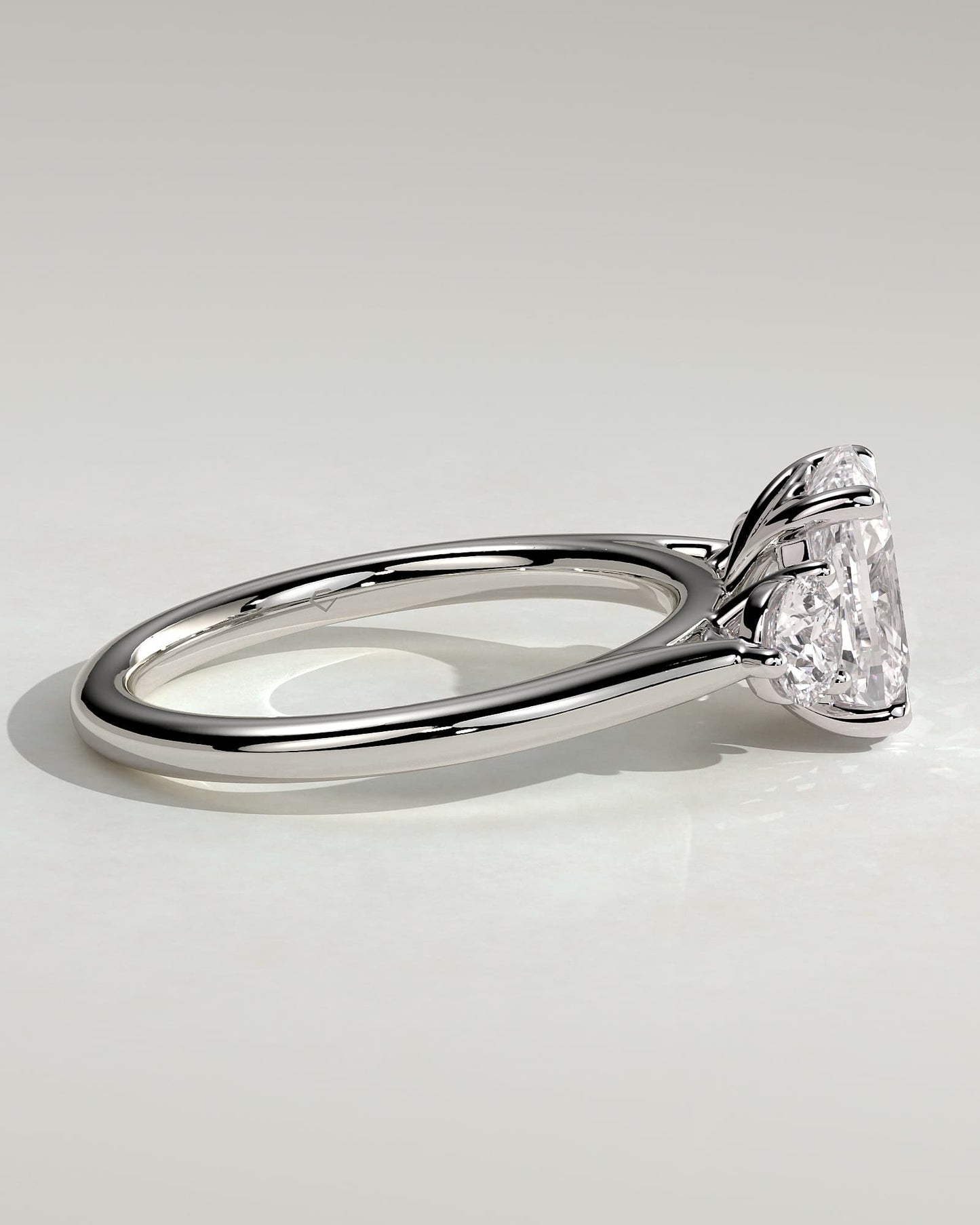Charmaine - Elongated Cushion Claw Trilogy with Round Side Stones and Lily Detail Engagement Ring - White Gold