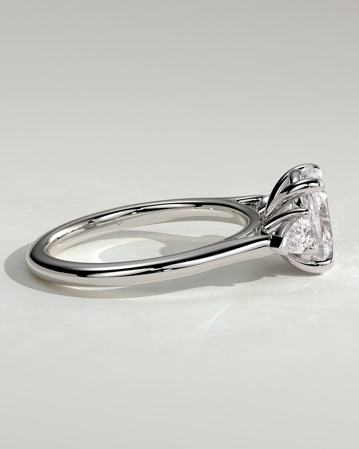 Cataleya - Elongated Cushion Claw Trilogy with Pear Side Stones and Cathedral Setting Engagement Ring - White Gold