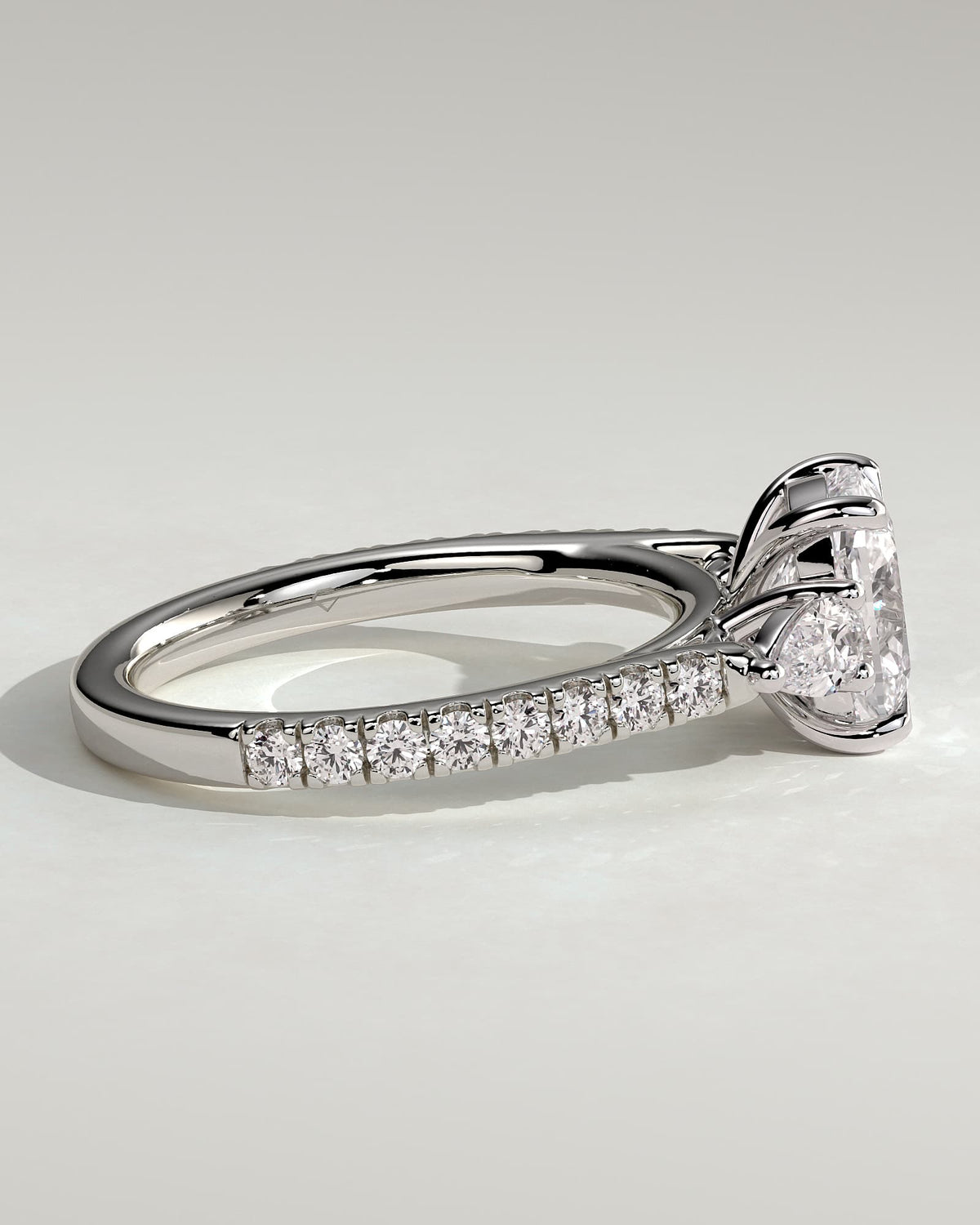 Bree - Elongated Cushion Claw Trilogy with Pear Side Stones and Pave Band Engagement Ring - White Gold