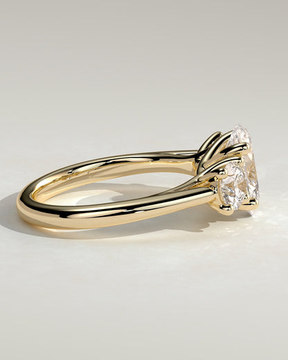 Grace - Oval Claw Trilogy with Round Side Stones, Open Trellis Gallery and Tapered Band Engagement Ring - Yellow Gold